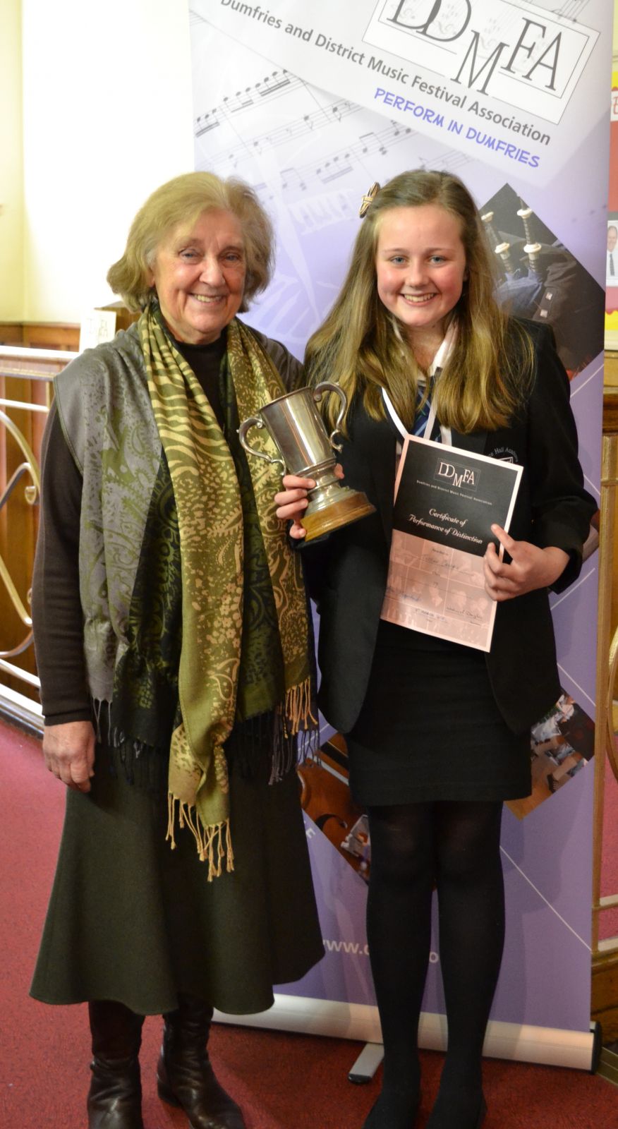 sbie Lucy Doig Nathan King Mia Osborne and Kieran Watson-.jpg: 54% uploaded Class 18 Adjudicator Brian Marjoribanks presents trophy to Mhairi Dalgleish Wallace Hall Academy.jpg: 76% uploaded Class 18 Adjudicator Brian Marjoribanks presents trophy to Mhairi Dalgleish Wallace Hall Academy (1).jpg: queued for upload Class 18 winner Mhairi Dalgeish Wallace Hall with her outstanding certificate.jpg: 70% uploaded Class 18 winner Mhairi Dalgleish with her tutor Mrs Sophia Harkness MBE.jpg: queued for upload Class 19 winner Bethany Campbell.jpg: queued for upload Class 20 winner Finlay Smail.jpg: queued for upload Class 22 winner Luke McKay.jpg: queued for upload Class 22 winner Luke McKay (1).jpg: queued for upload Class 23a winner Nirvana Singh from Noblehill Primary with adjudicator Brian Marjoribanks.jpg: queued for upload Class 23a winner Nirvana Singh Noblehill and second Stevie McDonald adjudicator Brian Marjoribanks 23b winner Ellie Ballamy Col.jpg: queued for upload Class 23b and winner of overall in class 23 Ellie Ballamy from Colvend with adjudicator Brian Marjoribanks.jpg: queued for upload Class 24 winner Callum Curry from St Ninian's primary school.jpg: queued for upload Class 24 winner Callum Curry from St Ninian's primary school with adjudicator Brian Marjoribanks.jpg: queued for upload Class 25 winner Lucy Doig Wallace Hall Academy.jpg: queued for upload Class 26 Adjudicator Brian Marjoribanks presents trophy to winner Mhairi Dalgleish and certificate of distinction to Elspeth Ni.jpg: queued for upload Class 26 Elspeth Nicholson and winner Mhairi Dalgleish both Wallace Hall.jpg: queued for upload Class 26 winner Mhairi Dalgleish.jpg: queued for upload Class 34 winner John McKay Penpont Primary 2.jpg: queued for upload Class 34 winner John McKay with adjudicator Jim Gibson.jpg: queued for upload Class 35 winner Jenna Patterson Hecklegirth Primary.jpg: queued for upload Class 36 winner Elspeth Nicholson Wallace Hall Academy with adjudicator Jim Gibson.jpg: queued for upload Class 37 Elspeth Nicholson and Eden Fisher both Wallace Hall Academy.jpg: queued for upload Class 37 Elspeth Nicholson and Eden Fisher both Wallace Hall Academy (1).jpg: queued for upload Class 38 winner Holly Clark from Hecklegirth primary.jpg: queued for upload Class 41 winner Eden Fisher Wallace Hall Academy.jpg: queued for upload Competitors in class 34.jpg: queued for upload Competitors in class 34 John McKay Isla Cooper Livia Nicholson Anna Pedley and Luke McKay.jpg: queued for upload Emma Webster - Class 21B winner.jpg: queued for upload Lois Geddes winnter of class 13 being presented with her trophy by a member of Dumfries Ladies Burns Club.jpg: queued for upload Max Coupland - Hecklegirth - Class 14A.jpg: queued for upload Mhairi Dalgleish Wallace Hall Academy with her trophies.jpg: queued for upload Mhairi Dalgleish Wallace Hall Academy with her trophies 2.jpg: queued for upload Mollie Anderson & Cameron McKenzie - Distinctioin - P6 - 7 duologue.jpg: queued for upload S1 - 3 Duologue winners - Catherine Anderson & Nathan King - distinction award.jpg: queued for upload Scots verse winners Justine Crosbie and Mhairi Dalgleish Wallace Hall Academy.jpg: queued for upload Sisters Catherine Anderson Wallace Hall Academy and Mollie Anderson Sanquhar Primary with their trophies.jpg: queued for upload Sisters Elspeth Nicholson WHA Livia Nicholson Penpont PS and Marianne Nicholson WHA are proud of their achievements.jpg: queued for upload Sisters Jasmine and Lydia McMillan Penpont Primary with their certificates of distinction.jpg: queued for upload Stevie McDonald from St Ninian's primary with her certificate of distinction.jpg: queued for upload Winner of class 12.jpg: queued for upload Winner of class 16 Troy Barbour from Sanquhar Primary.jpg: queued for upload