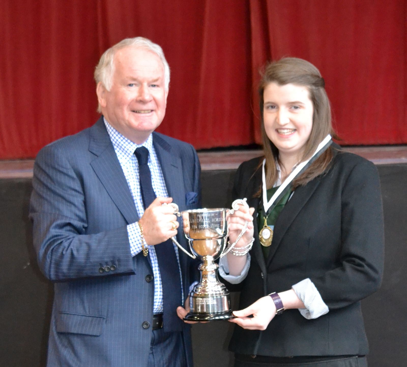 Class 18 Adjudicator Brian Marjoribanks presents trophy to Mhairi Dalgleish Wallace Hall Academy