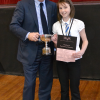 Class 5 winner Mollie Anderson from Sanquhar primary gets her trophy from adjudicator Brian Marjoribanks