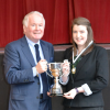 Class 18 Adjudicator Brian Marjoribanks presents trophy to Mhairi Dalgleish Wallace Hall Academy