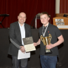 Kyle Rowan with adjudicator Wayne Robertson receiving the Max Houliston Cup (Junior Trad Accordion Solo)<br/><a href="gallery/2016-accordion-and-fiddle/871/add/#comments">Add comment</a>
